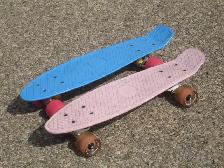 HAVE 2 PENNY SKATEBOARDS BLUE & PINK $20.00 EACH & FIRM!