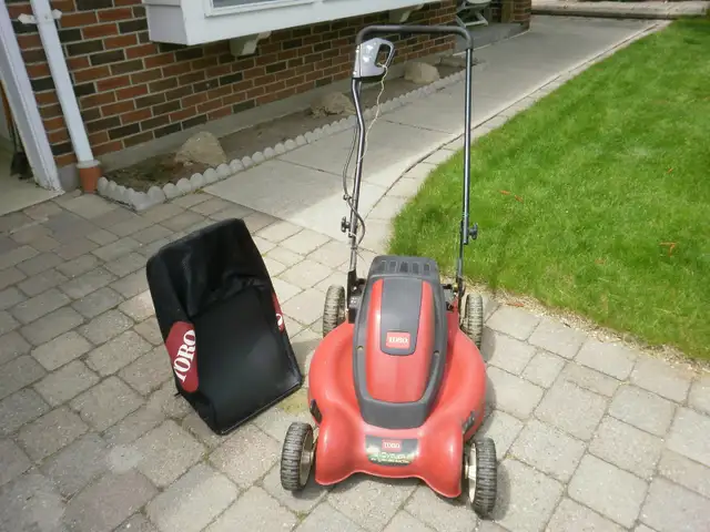 Sale $50 . Toro electric lawn mower .  12 year old .