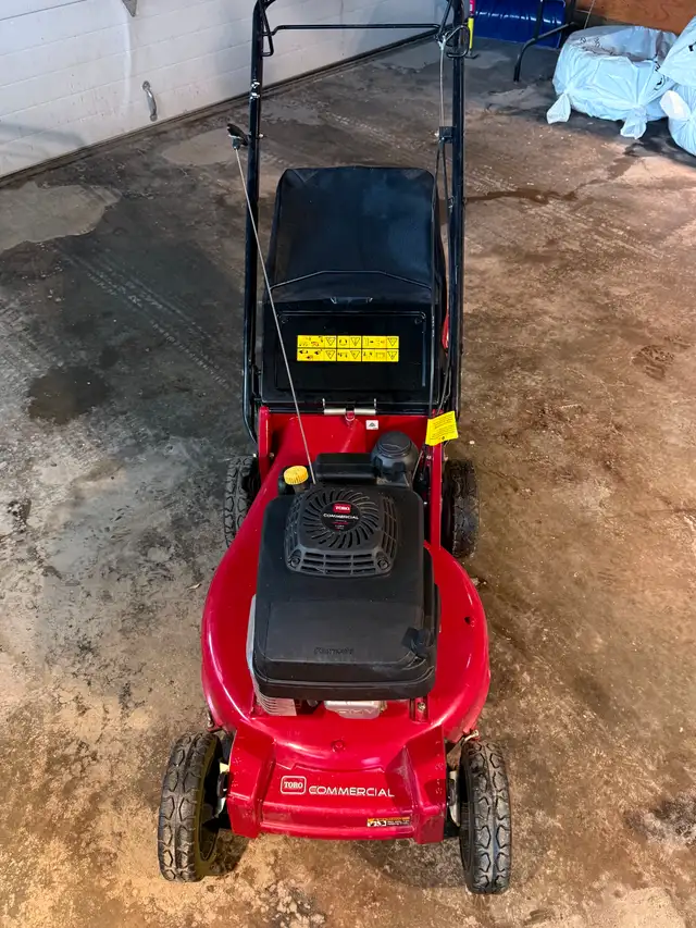 TORO self-propelling gas mower with bag