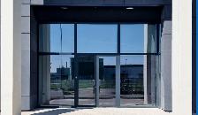 Premium European Windows & Doors, Overhead Doors and more. - Photo 2