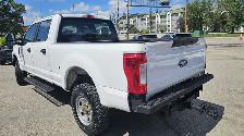 This Pickup powered by a Gasoline engine featuring 4WD/4-Wheel D - Photo 4