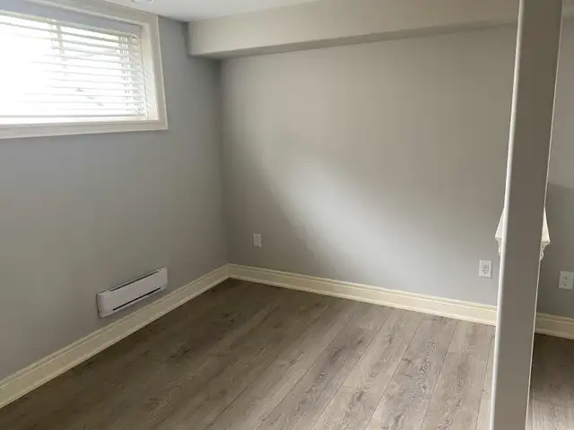 NEWLY RENOVATED, OPEN CONCEPT, BACHELOR BASEMENT APARTMENT