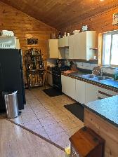 Off Grid home on year round road. - Photo 3