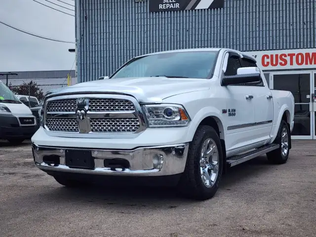 2014 Ram 1500 4WD Crew Cab 140.5' Laramie