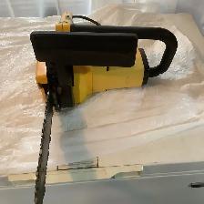 Electric chain saw - Photo 2