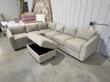 Beige fabric sectional with storage ottoman - Photo 2