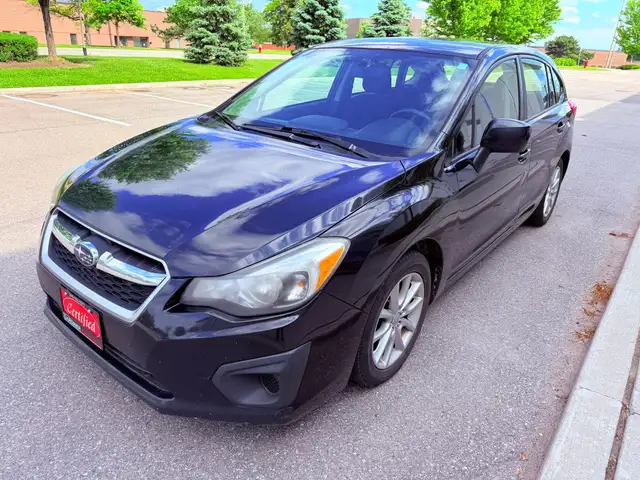 2013 Subaru Impreza 4dr Sedan 2.0i w/Touring Pkg