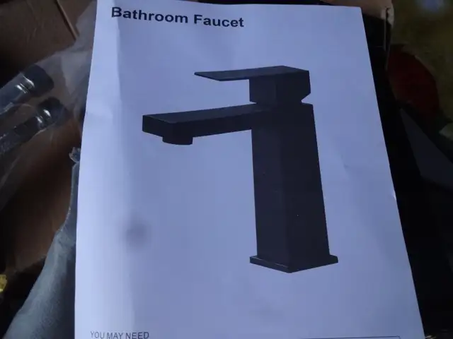 brand new never installed Kuzor modern bathroom faucet