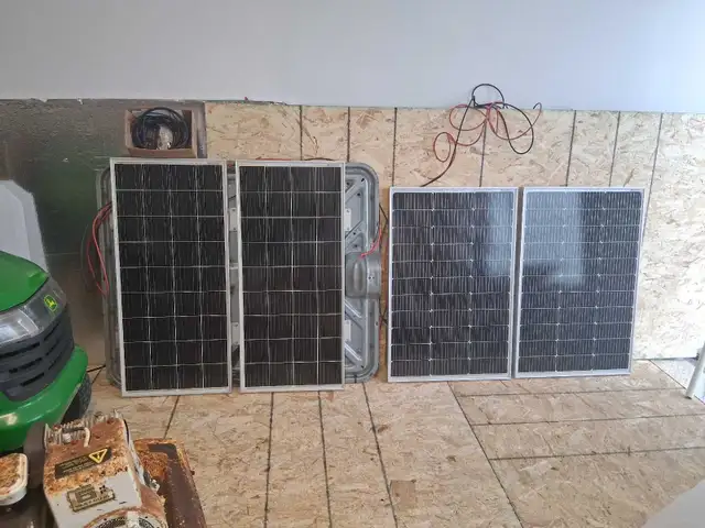 4 of 100watt solar panels (2new/2=1yr.) 2chg.controllers wiring
