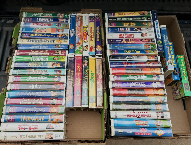 I HAVE 52 WALT DISNEY  VHS MOVIES FOR SALE