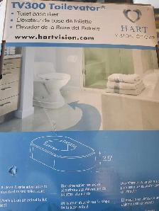 Toilet base riser
