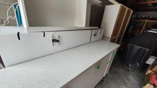 4 pieces Kitchen Cupboards and countertop with large cupboard.