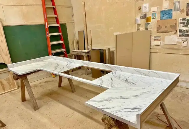 Shiny White Kitchen Countertop With Greyish Veins