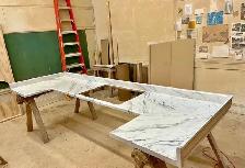 Shiny White Kitchen Countertop With Greyish Veins