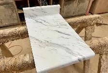 Shiny White Kitchen Countertop With Greyish Veins - Photo 2