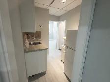 SPACIOUS GROUND-LEVEL COMMERCIAL SUITE WITH LARGE FRONT WINDOWS - Photo 4