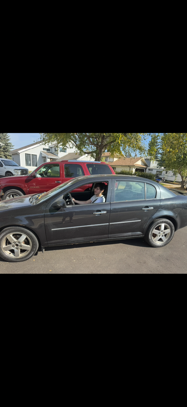 2010 Chev Cobolt command start 2 sets of rims and tires
