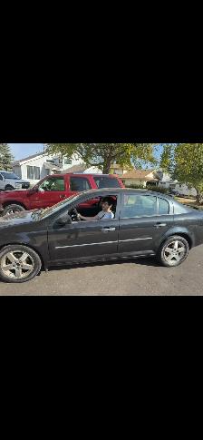 2010 Chev Cobolt command start 2 sets of rims and tires