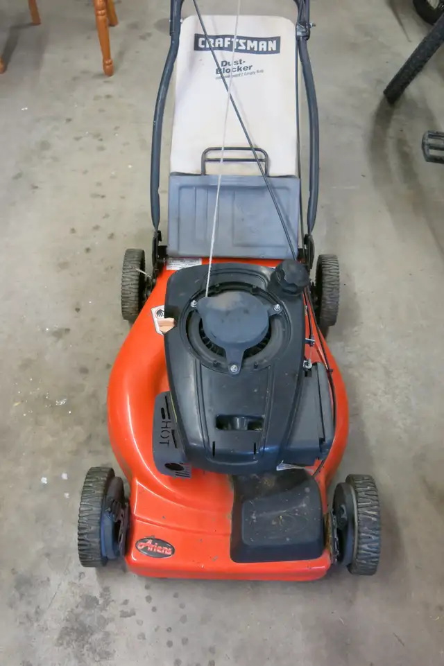 Ariens self-propelled lawnmower and bag