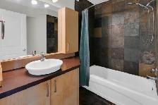 MODERN 2 BED SUNALTA CONDO WITH IN-SUITE LAUNDRY & PARKING - Photo 7
