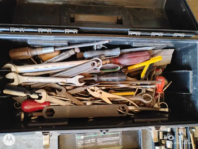 Tool box full of wrenches, screw drivers ETC
