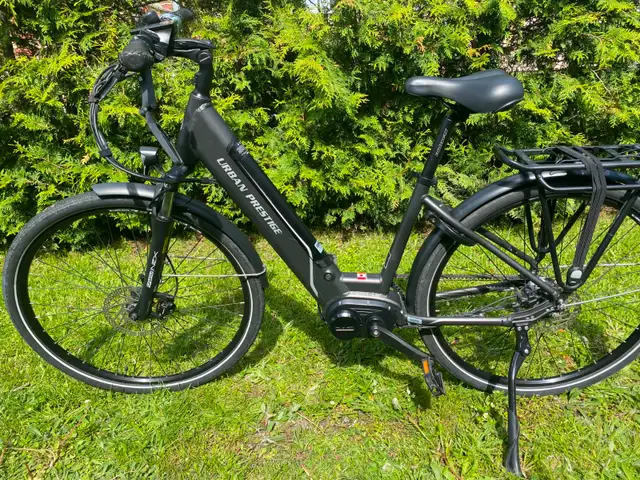 VÉLO À COURROIE / ASSISTANCE ÉLECTRIQUE