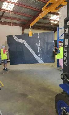 Black Quartz Countertop With Big Stylish Vein - Photo 3