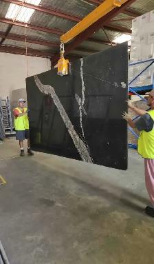 Black Quartz Countertop With Big Stylish Vein - Photo 4