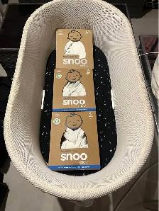 SNOO smart sleeper bassinet with 3 sleeps sacs