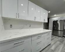 Plain White Countertop With Stylish Island