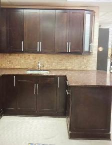 Taj Mahal Granite Countertop With Wooden Island - Photo 4