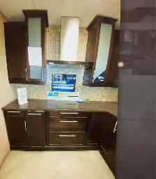 Taj Mahal Granite Countertop With Wooden Island - Photo 5