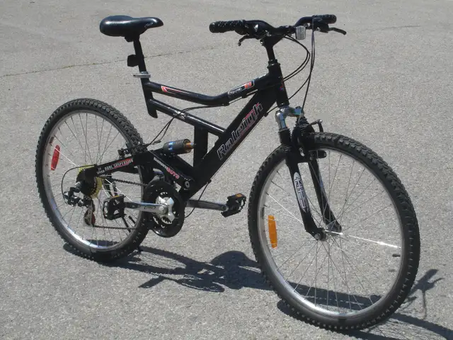 LIKE NEW ALL ALUMINUM 26' RALEIGH TORA 21 SPD   DUAL SUSPENSION!