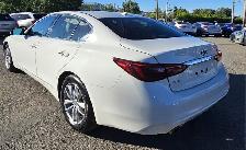 This Sedan/Saloon powered by a Gasoline engine featuring 4WD/4-W - Photo 17