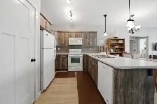 UP/DOWN LEGALLY SUITED HOME IN BLACKFALDS - Photo 2