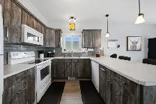 UP/DOWN LEGALLY SUITED HOME IN BLACKFALDS - Photo 3