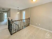 Beautiful 3-Bedroom Home in Riverside South | Finished Basement - Photo 7