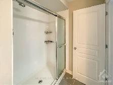 Beautiful 3-Bedroom Home in Riverside South | Finished Basement - Photo 8