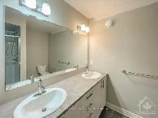 Beautiful 3-Bedroom Home in Riverside South | Finished Basement - Photo 9