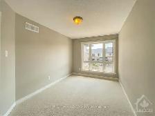 Beautiful 3-Bedroom Home in Riverside South | Finished Basement - Photo 14