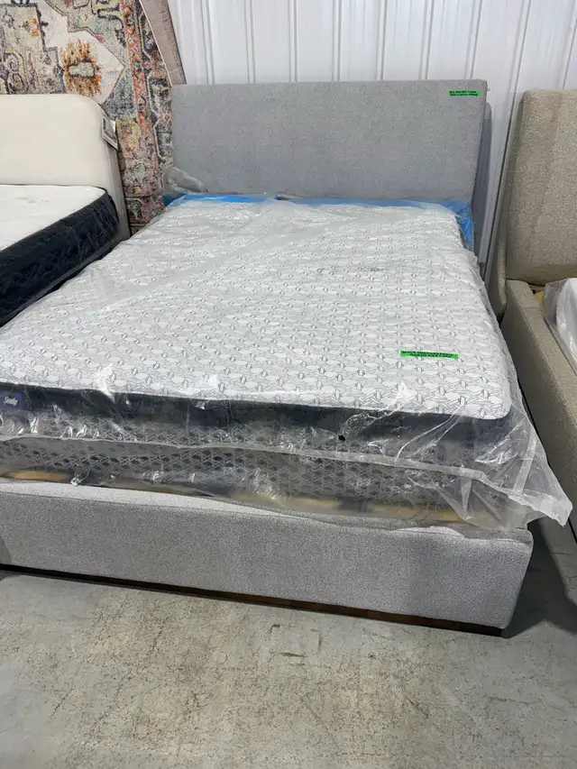 Queen sized bedframe with posturepedic mattress