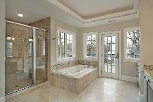 Bathroom renovation with glass enclosure