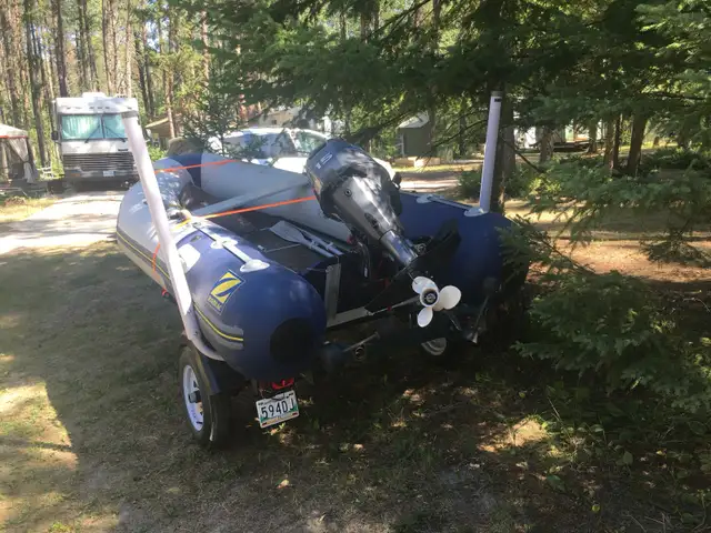 ZODIAC, MOTOR & TRAILER