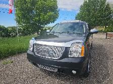 2012 GMC Yukon XL, seats 8 - Photo 2