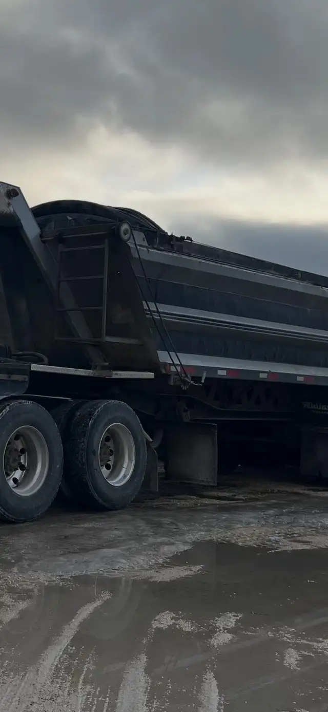 Semi dump truck driver