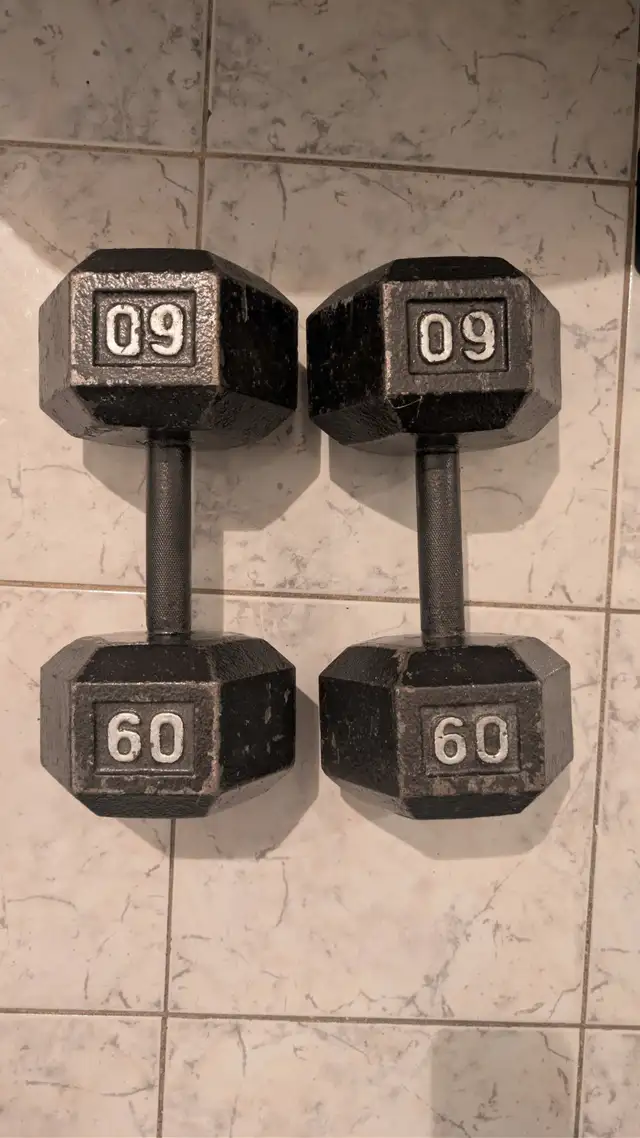 Pair of 60 lb cast iron hex dumbbells