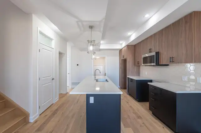 Luxury 4 bedroom upper unit with master balcony & double garage