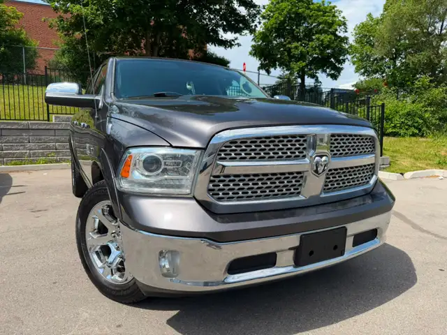 2015 Ram 1500 4WD Crew Cab 140.5' Laramie