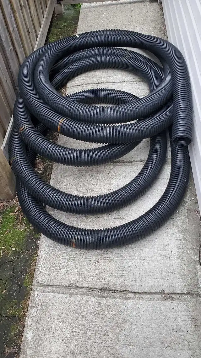 70 feet of Armtec 4 inch non-perforated HDPE plastic hose.