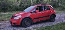 Suzuki  sx4  2009 - Photo 2